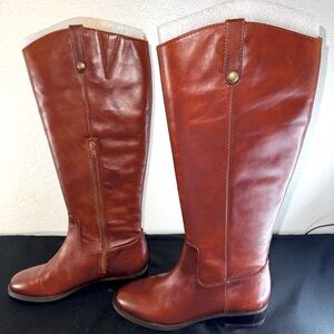 Brown tall leather boots. New, no tags, no box. Size 7.5 regular.